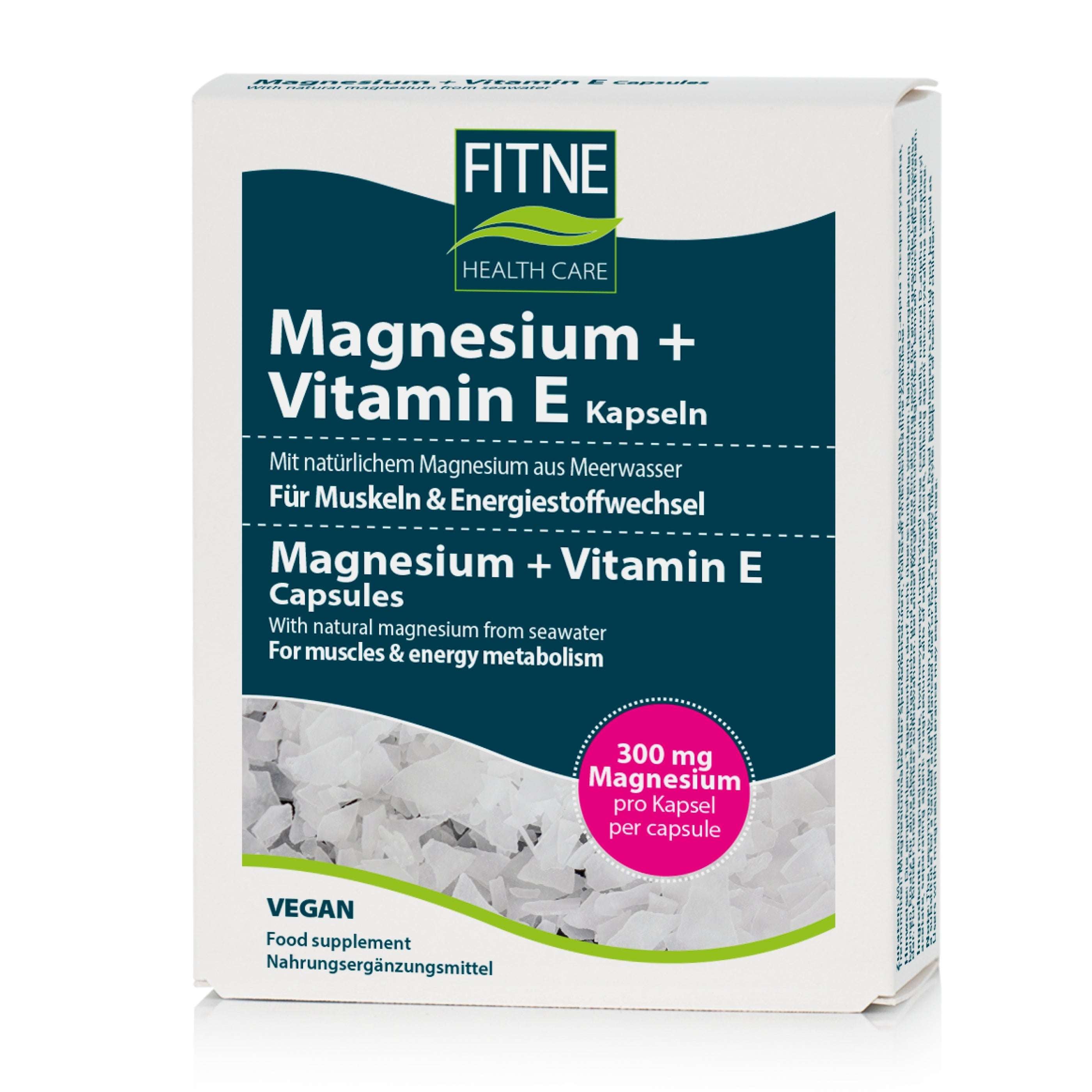 Eine Packung fitne Magnesium + Vitamin E Kapseln mit veganer Kennzeichnung enthält 300 mg Magnesium pro Kapsel. Die weiß-blaue Verpackung enthält deutschen und englischen Text sowie Abbildungen weißer Kristalle zur Unterstützung des Energieflusses.