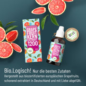 Eine Flasche und eine Schachtel FITNE Health Care Grapefruit-Kern-Extrakt mit Grapefruit-Motiven werden mit geschnittenen Grapefruits gezeigt. Darunter befinden sich ein pflanzlich-veganes BIO-Etikett und ein deutscher Text, der Bioflavonoide und Bio-Zutaten hervorhebt.