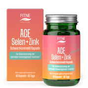 Eine Flasche und Schachtel FITNE Health Care ACE + Selen + Zink Schwarzkümmelöl Kapseln, ein deutsches Ergänzungsmittel mit Antioxidantien zur Unterstützung des Immunsystems. Enthält 60 Kapseln (60 Tage) in einer leuchtend pink-orangefarbenen Verpackung mit weißem und grünem Text.