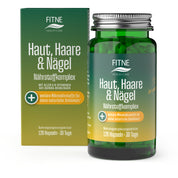Eine grüne Flasche und Schachtel mit der Aufschrift FITNE Health Care Nährstoffkomplex Haut, Haare & Nägel, mit 120 Kapseln für 30 Tage. Die deutsche Verpackung hebt Biotin, Zink, Vitamin A und natürliche Schönheitsunterstützung hervor.