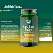 Eine grüne Flasche FITNE Health Care Nährstoffkomplex Haut, Haare & Nägel mit 120 Kapseln ist auf einer gelb-grünen Fläche mit deutschen Details abgebildet. Enthält Biotin, Zink und Vitamin A zur Unterstützung der Schönheit.